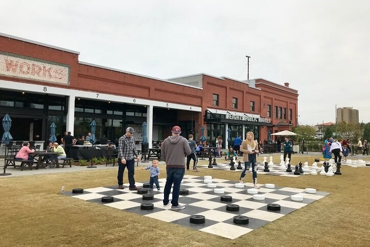giant checkers on lawn at armature works in Tampa, FL