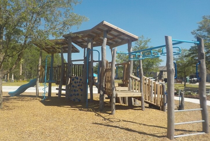 Wooden gym style playground at Gimme-10 park
