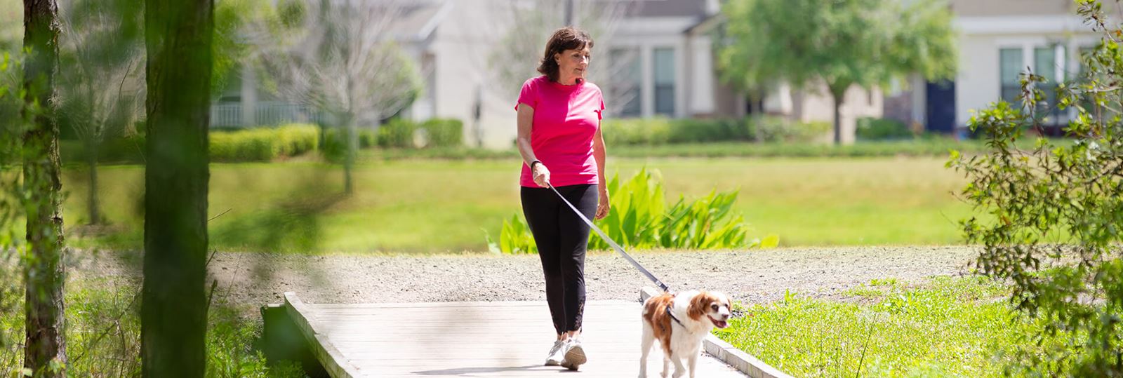 Woman walks the trails at Bexley located in Pasco County