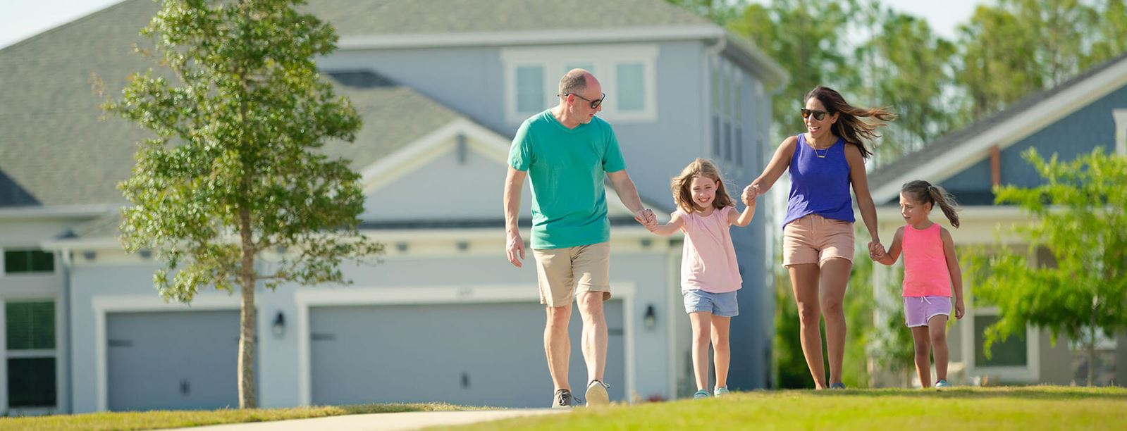 Family walking along community park at Bexley in Land O’ Lakes.